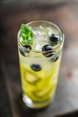 Blueberry cocktail with kiwi fruit. Selective focus. Shallow depth of field.
