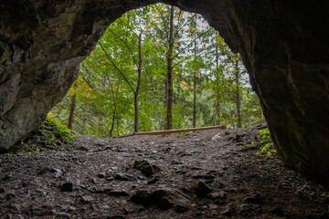 Dziura Cave in Polish Tatras. Photo of the entrance hole located at the end of the Dolina ku Dziurze trail