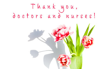 Bouquet of flowers and text Thank you doctors and nurses on white background