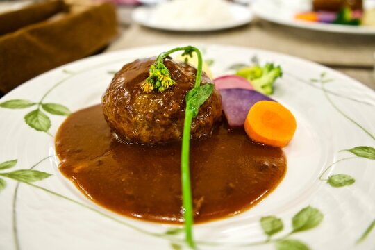 A Beef Hamburger Steak With Demiglace Sauce.