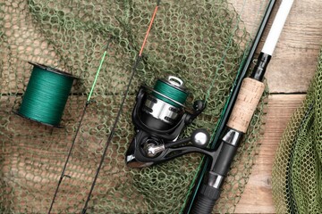 top view of spin fishing rod with fishing line