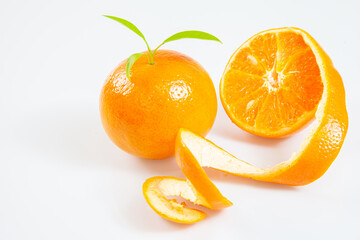 Orange mandarin or tangerine fruit skin textures . Juicy Orange in a orange peeled isolated on white background