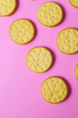 Sandwich cookies on pink background. Trendy minimal food. Simple bakery, top view