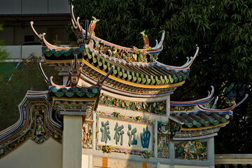 entrance gate with Chinese calligraphy and porcelain tiles inThe Blue Mansion in George Town,...