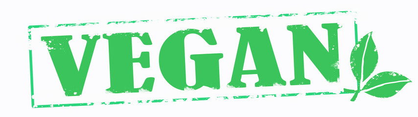 Veganism banner - Green grunge stamp, with the words "VEGAN " with green leaves, isolated on white background, with copy space 