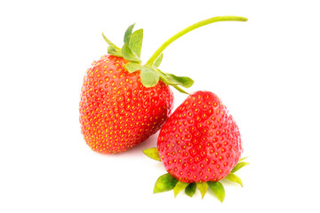 Red, beautiful. tasty, juicy strawberry with green leaves on a white background.
