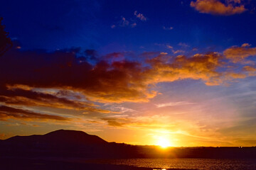 Obraz premium Corralejo the sun setting over Los Lobos Fuerteventura Canary Islands Spain