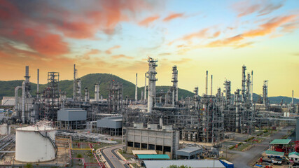 Aerial view by drone of oil petrochemical refinery plant during  sunset time