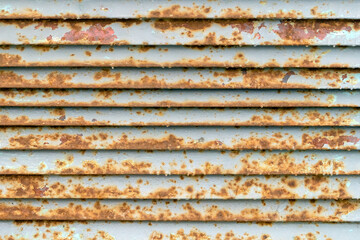 Texture of metal stripes painted with gray paint with traces of rust.
