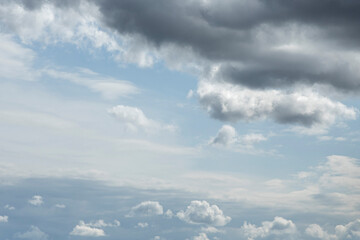 The background texture and dramatic sky with low clouds