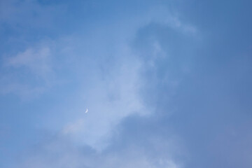 The background texture and dramatic sky with low clouds