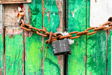Door with padlock. The padlock as a security element used in various parts of the world. The padlock also symbolizes the union between couples.