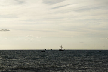 Yacht on the high seas, coast