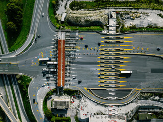 Aerial view gate for expressway fee payment in the city, toll collection point on the motorway