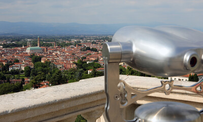binoculars for tourists and the city of Vicenza in Northern Ital