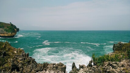 Beautiful beach with stunning views of rocks, nature and whites sand
