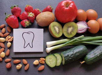 Assortment of food for healthy teeth and healthy smile. Selection of foods for stronger whiter...