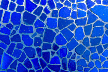 blue colorful stone mosaic tiles on the wall as background or texture,mosaic background