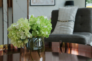 Close up fake plant on coffee table, decoration in living room
