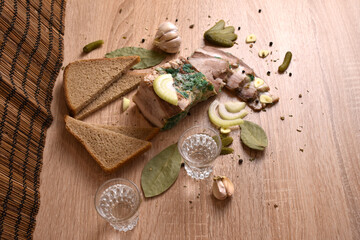 two glasses of vodka and an appetizer