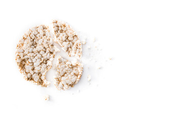 Broken puffed rice cake isolated on white background. Top view. 
