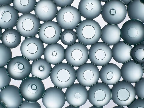photo de sphères collées entre elles comme une structure moléculaire vue au microscope, ensemble de cellules rassemblées comme une protection