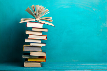 Books on wooden desk table and abstract background. Education background. Copy Space. Back to...