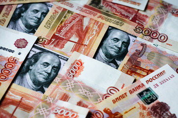 Russian paper money. Rubles and dollars. A 5000-ruble banknote. Finance.