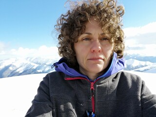 Woman climbing  mountains. Portrait of a woman hiker