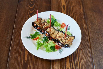 A plate of food sitting on top of a wooden table