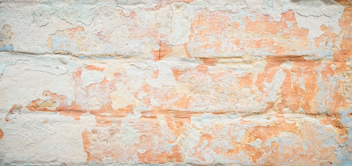 Old shabby painted brickwork background