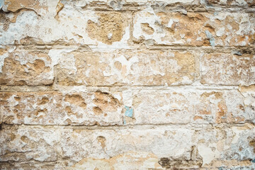 Old shabby painted brickwork background