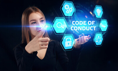 Business, Technology, Internet and network concept. Young businessman working on a virtual screen of the future and sees the inscription: Code of conduct