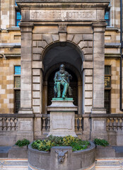 Fototapeta na wymiar Public Statue of historic Belgian author Hendrik Conscience outside the heritage library.
