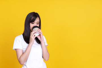 Asian woman hold paper cup hot coffee beverage have drinking break work process wear specs casual white shirt isolated color background