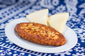 Georgian traditional food Chvishtari, corn meal with cheese and corn. Baked and ready to eat.