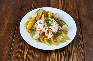 A plate of food sitting on top of a wooden table
