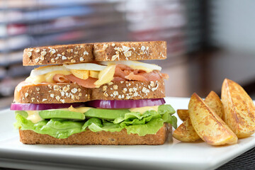 salmon sandwich with potatoes