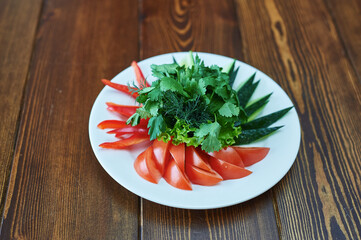 A plate of food sitting on top of a wooden table