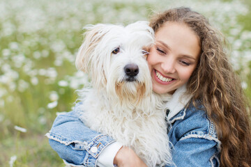 Portrait of a beautiful woman with dog.