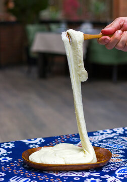 Georgian traditional food Elarji, meal with cheese and corn, baked and ready to eat, on the table in restaurant.