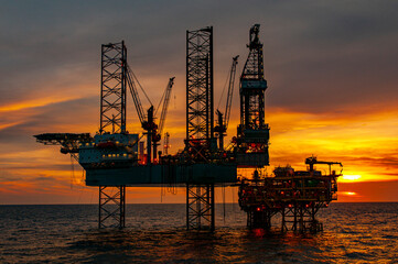 oil rig at sunset