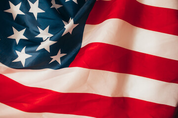 Closeup of ruffled American flag. Toned picture.