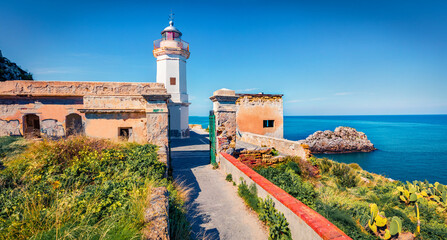 Fototapeta na wymiar Superb morning view of Zafferano cape with old lighthouse. Wonderful summer seascape of Mediterranean sea, Sicily, Italy, Europe. Traveling concept background.