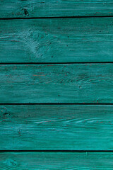 abstract background of old green boards with a beautiful texture with knots
