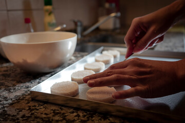 woman hands preparing dough