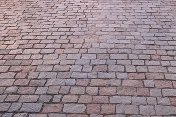 Antique stone pavers as background. Prague pavement.