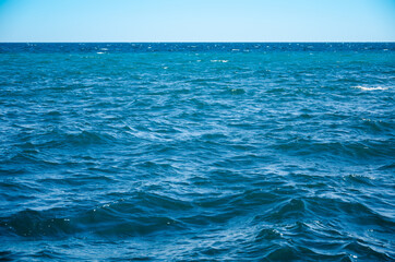 Seascape background vivid blue sea and clear sky