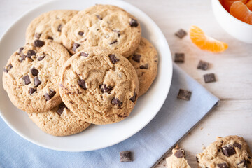Chocolate chip cookies and tangerine