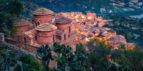 Panoramic morning view of Stilo town with Cattolica di Stilo church. Colorful summer scene of Apulia region, Italy, Europe. Traveling concept background.